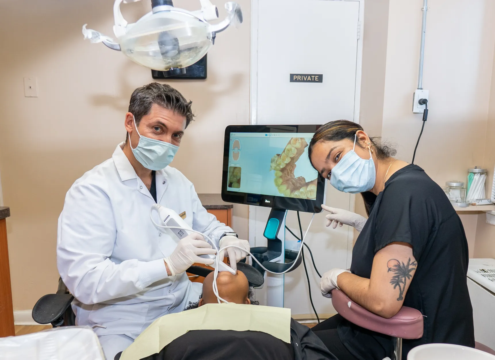 Dr. Khodosh checking up patient